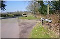 Junction of road with lanes and public footpath