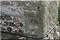 Benchmark on the Church of St Mary the Virgin, Winterborne Stickland