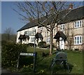 Intriguing sign for Cork in Cerne Abbas