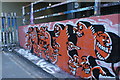 View of street art on the Station Approach Road ramp next to Leake Street #2