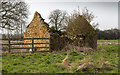 Derelict building by the footpath