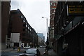 TQ3480 : View up Leman Street #2 by Robert Lamb