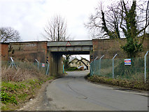 TR3364 : Railway bridge over Cottington Road by Robin Webster