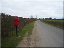 TL6767 : Elizabeth II postbox near La Hogue Farm by JThomas
