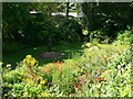 Pretty garden with a statue at Abepwll