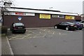 Yellow parking bays on the east side of  Bettws Shopping Centre, Newport