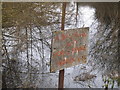 Worn out sign at Frogmore Lakes