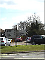 TM1853 : Roadsigns on the B1077 Ashbocking Road by Geographer