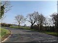 TM1855 : B1077 Helmingham Road & footpath by Geographer