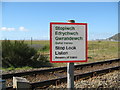 SH6214 : West to Fairbourne bilingual warning - Morfa Mawddach, Gwynedd by Martin Richard Phelan