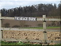 TM1254 : Vicarage Farm sign by Geographer