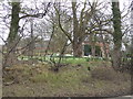 Walford House in early spring with Snowdrops in the gardens