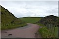 Minor road winding through pass