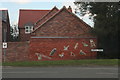 Decorated (Millennium?) wall, Lincoln Road, Bassingham