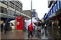 Red police box and market