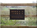 TM1353 : Retreat East sign at Brick Kiln Farm by Geographer