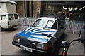 View of a Mazda 323 in the "For Sale" section of the Classic Car Boot Sale