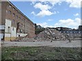 Heaps of spoil, factory demolition, Ottery St Mary