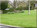 Seat on grassy area in Mannings Heath