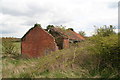 Derelict farm buildings on the road to Mareham on the Hill