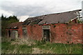 Derelict farm buildings on the road to Mareham on the Hill