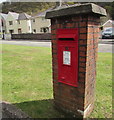 Queen Elizabeth II postbox in a brick pillar, Tonna