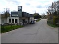 The garage at Tipton St John and the bridge