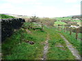 Stile where the footpath leaves the field access track,Mytholmroyd