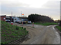 Stygate Lane passes the entrance to Stygate Farm