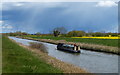 Narrowboat heading north along the Fossdyke Canal