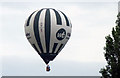SK7518 : Hot air balloon G-WILB over Sandy Lane by Andrew Tatlow