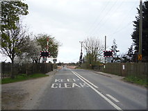 TG2811 : Level crossing on Plumstead Road by JThomas