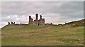 NU2521 : Dunstanburgh Castle by Chris Morgan