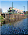 SK5738 : Nottingham Canal and the new fire station by John Sutton