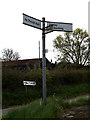 TM1451 : Roadsign & Mill Lane signs on Mill Lane by Geographer