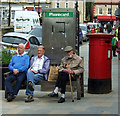 SE7984 : Three men a postbox, and a telephone box, Market Place, Pickering by JThomas