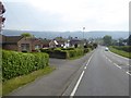 Houses and bungalows on B4075 west of Prestbury