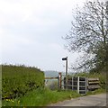 Kissing gate and footpath from Cleeve Hill to Woodmancote