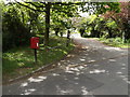 TM1848 : Oak Cottage Postbox & Village Hall entrance by Geographer
