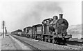 Down Midland line freight at Naas Crossing near Haresfield, 1949