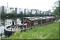 View of Joshua moored up on the Hertford Union Canal from the towpath