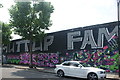 View of "Shuttup Fam" street art on Bream Street