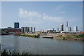 View of derelict industrial land and the Olympic Park from the River Lea Navigation