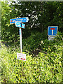 TM1054 : Signs off Norwich Road by Geographer