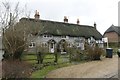 SU5730 : Thatched Cottages by Bill Nicholls