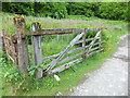 A derelict gate that says "Railway"