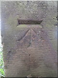 TA0684 : Bench mark on old milestone on Osgodby Hill by John S Turner