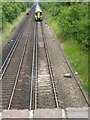 Down train from Burgess Hill approaches bridge carrying bridleway
