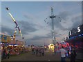 NZ2466 : Dusk at The Hoppings funfair, Newcastle upon Tyne by Graham Robson