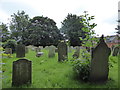 TL1997 : St Margaret, Fletton: gravestones by Basher Eyre